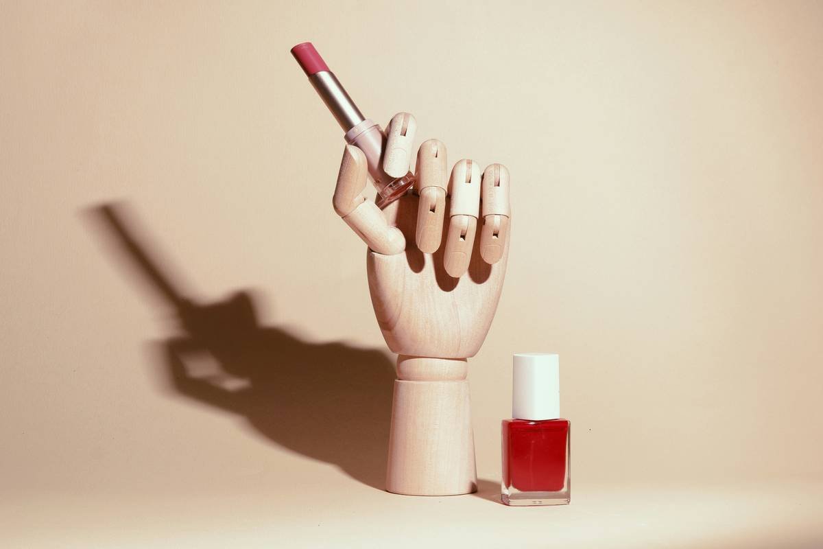 Microscope cross-section showing dense vs. porous silicone in nail stampers