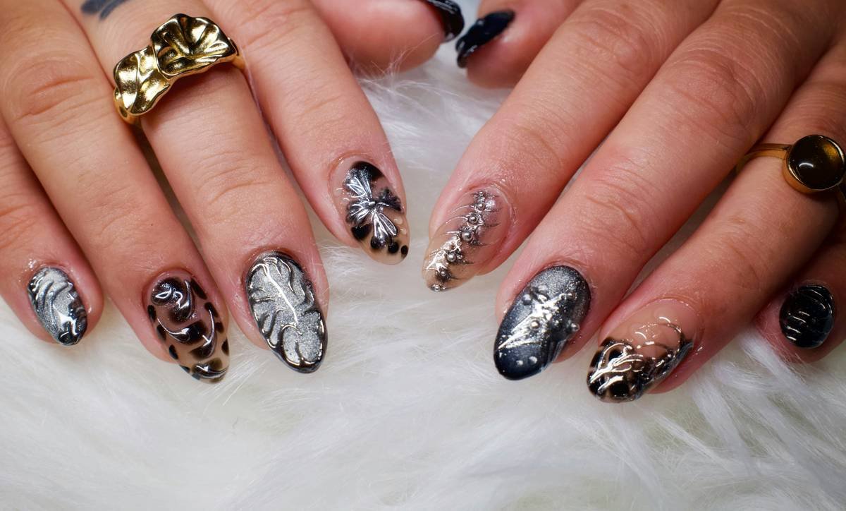 Infographic showing 4 types of nail art fragments: holographic shards, cyber chrome flakes, crafted glass pieces, and bio-glitter with labels and safety notes