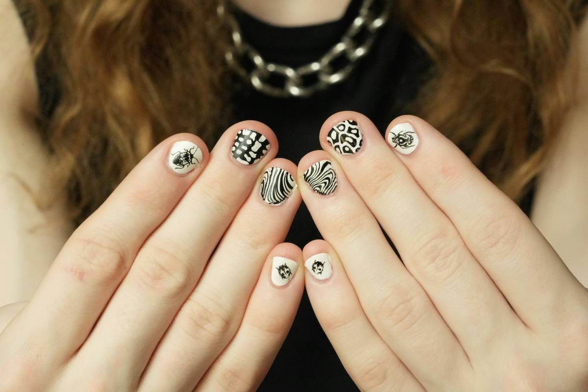 Side-by-side comparison of professional vs. budget nail art tools showing bristle integrity, handle durability, and glitter adhesion results