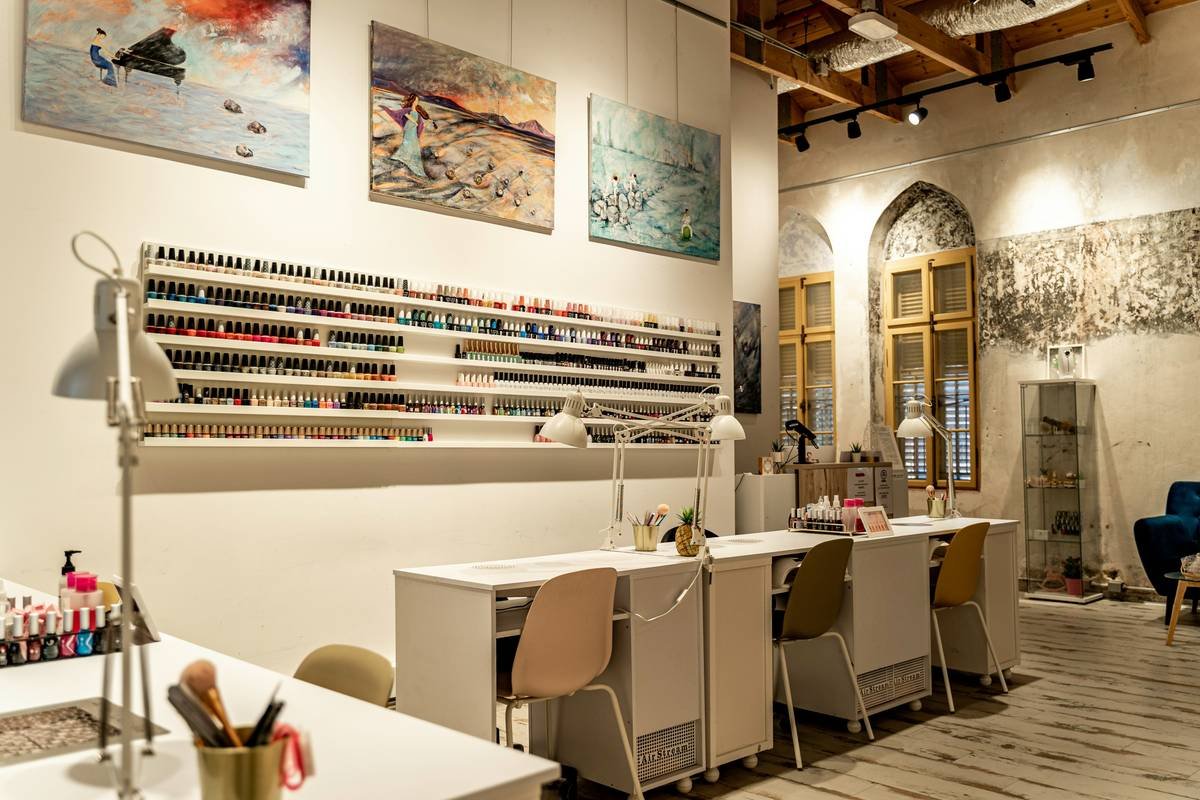 a nail salon with a lot of bottles of nail polish