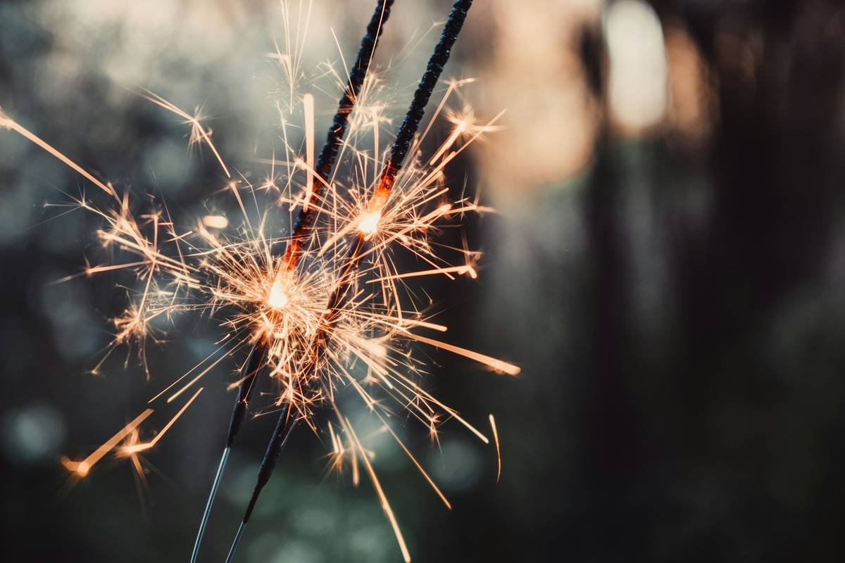 selective focus photo of sparkle stick